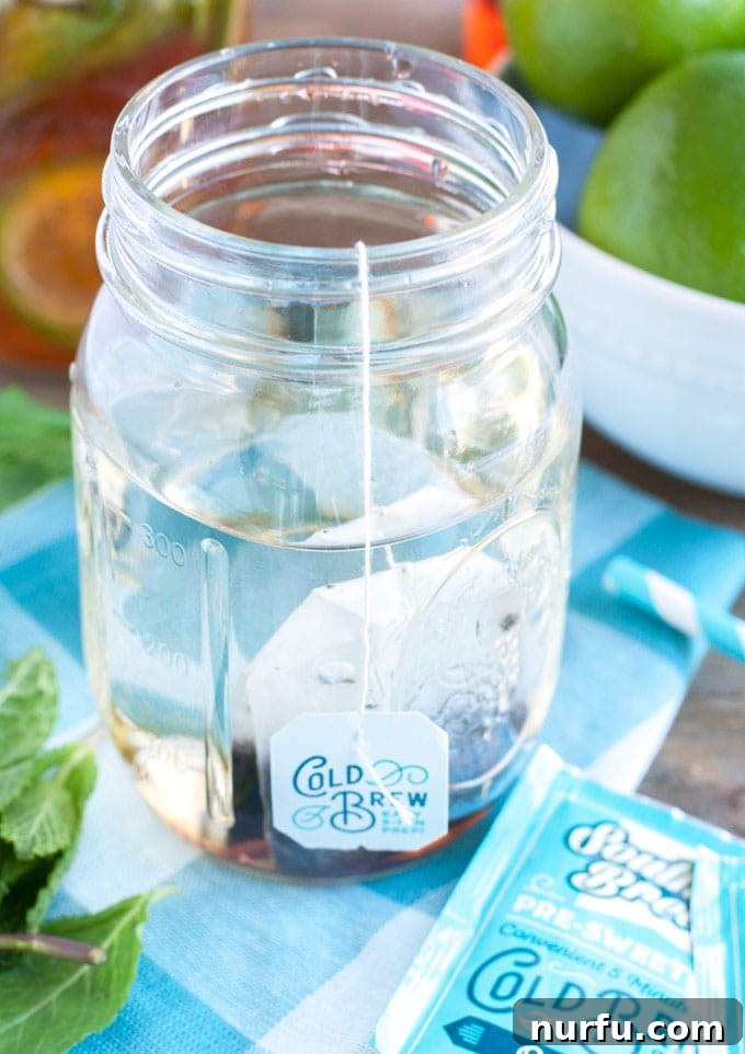 Mojito Sweet Tea Twist 4 Fresh mint leaves and lime slices, essential ingredients for mojito