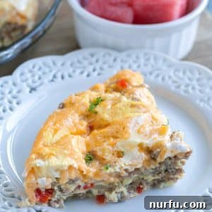 Piece of breakfast casserole on a plate.