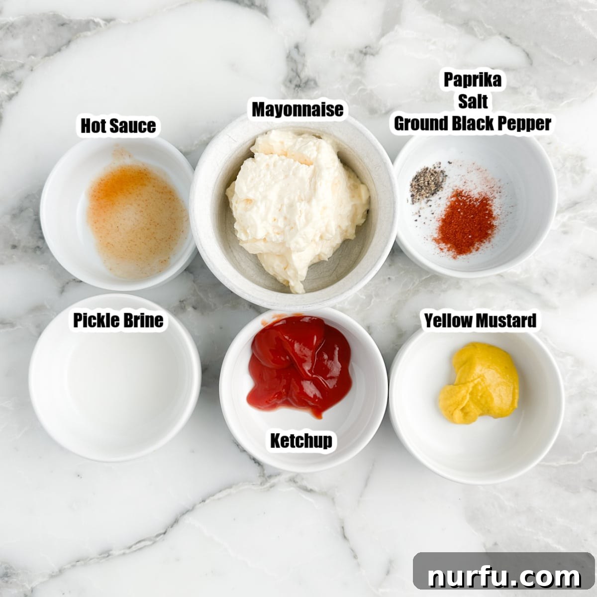 The Ultimate Smashburger Sauce 3 Bowls containing the individual ingredients for smashburger sauce: ketchup, mustard, mayonnaise, seasonings, hot sauce, and pickle juice.