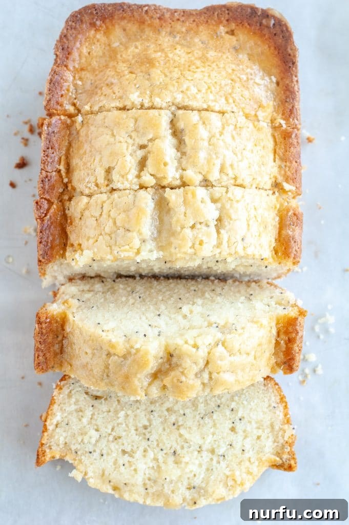Classic Almond Poppy Seed Cake 2 sliced poppy seed cake