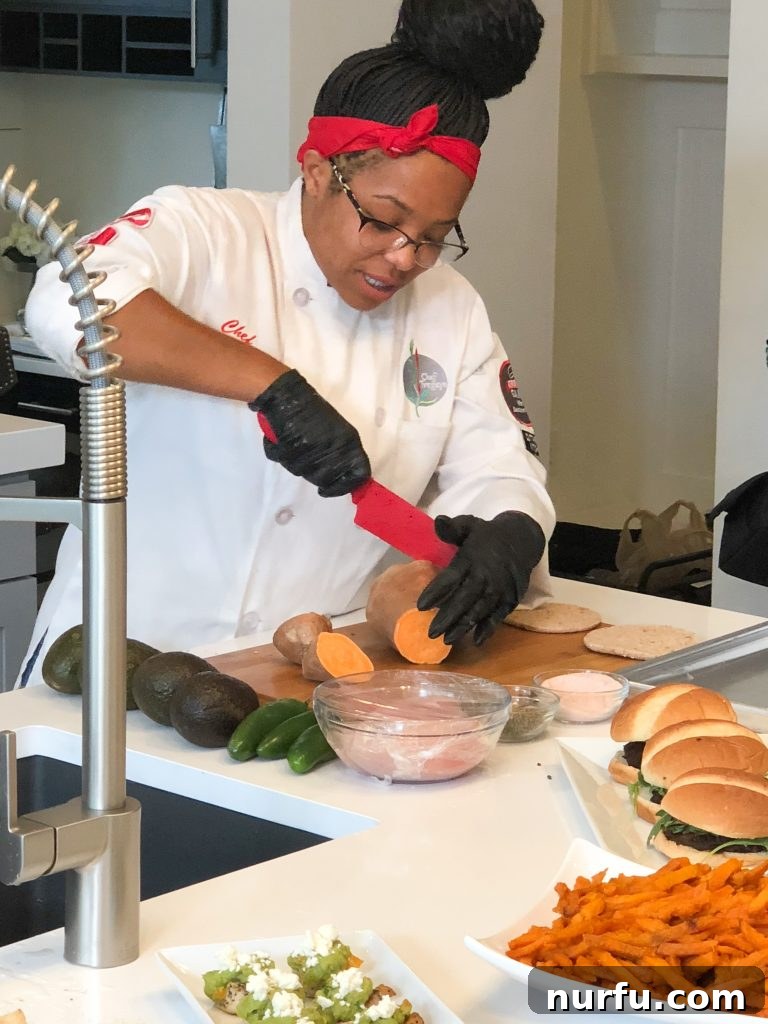 chef cutting sweet potato Chef Tregaye demonstrating how to cut sweet potatoes for fries