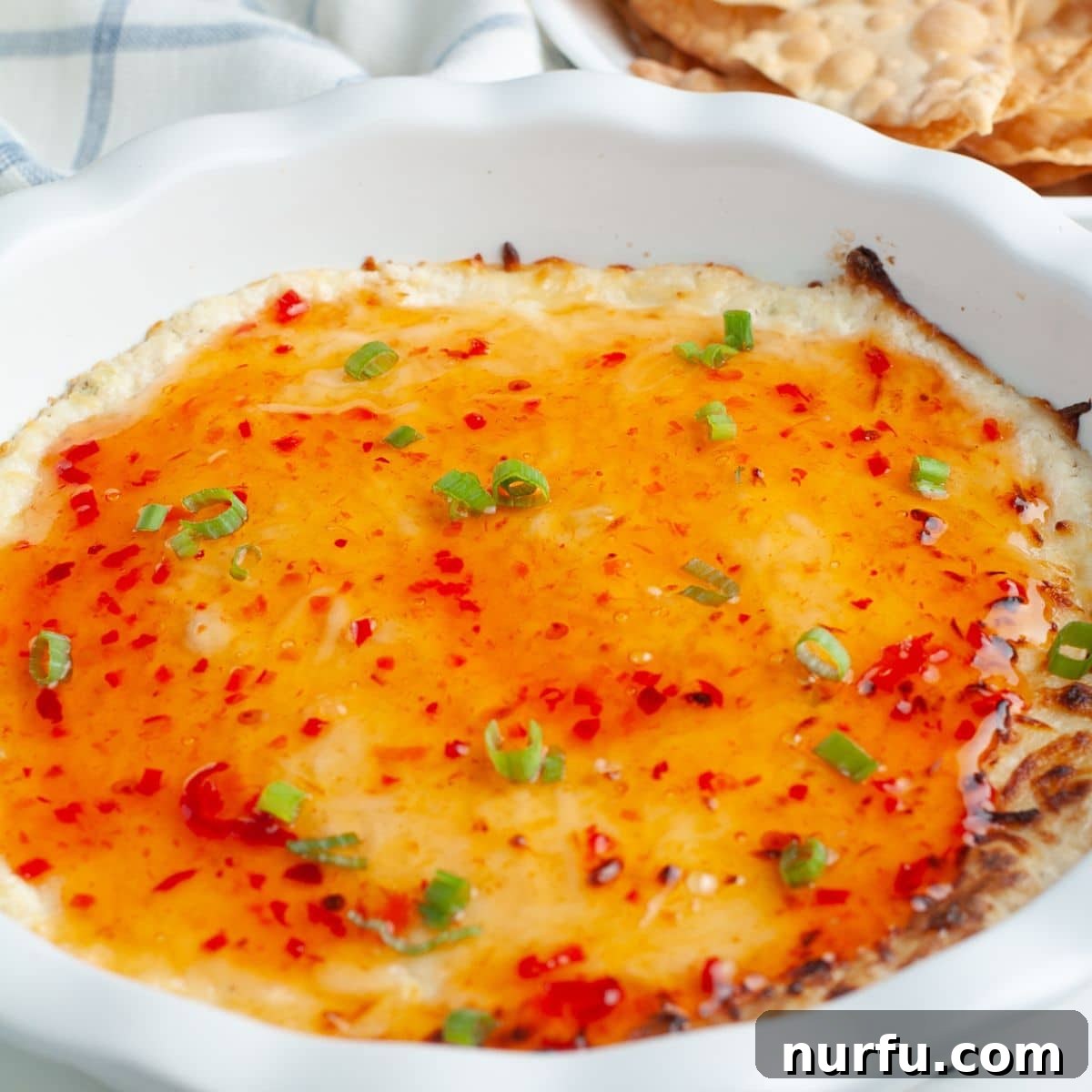 Irresistible Crab Rangoon Dip 7 Baking dish with crab rangoon dip.