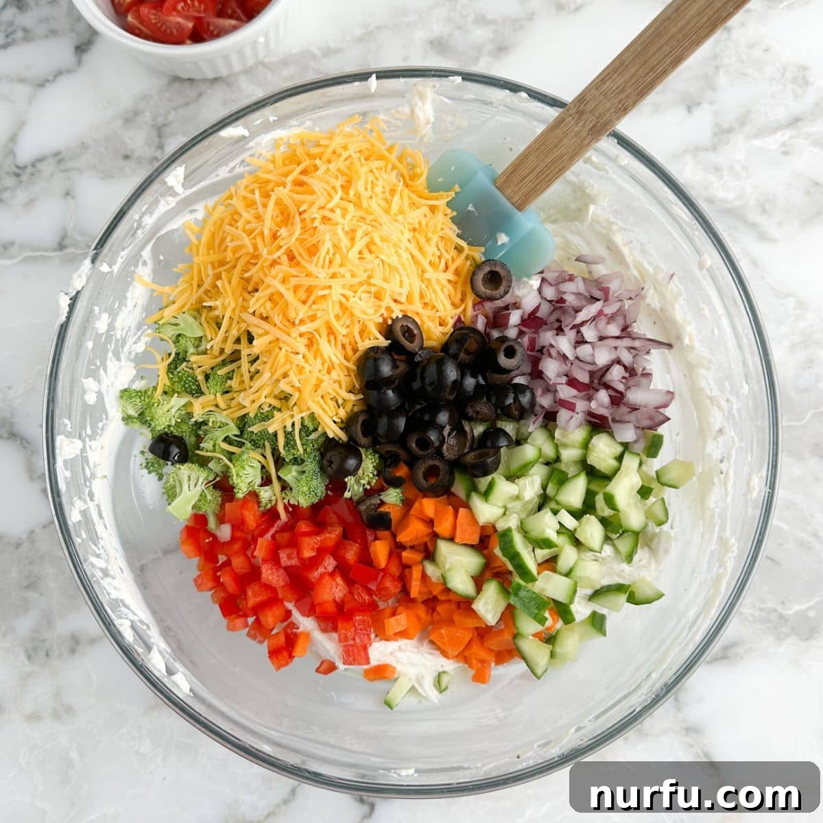 Garden Fresh Pizza Dip 5 Bowl with shredded cheese, diced peppers, cucumbers, red onion, and broccoli.