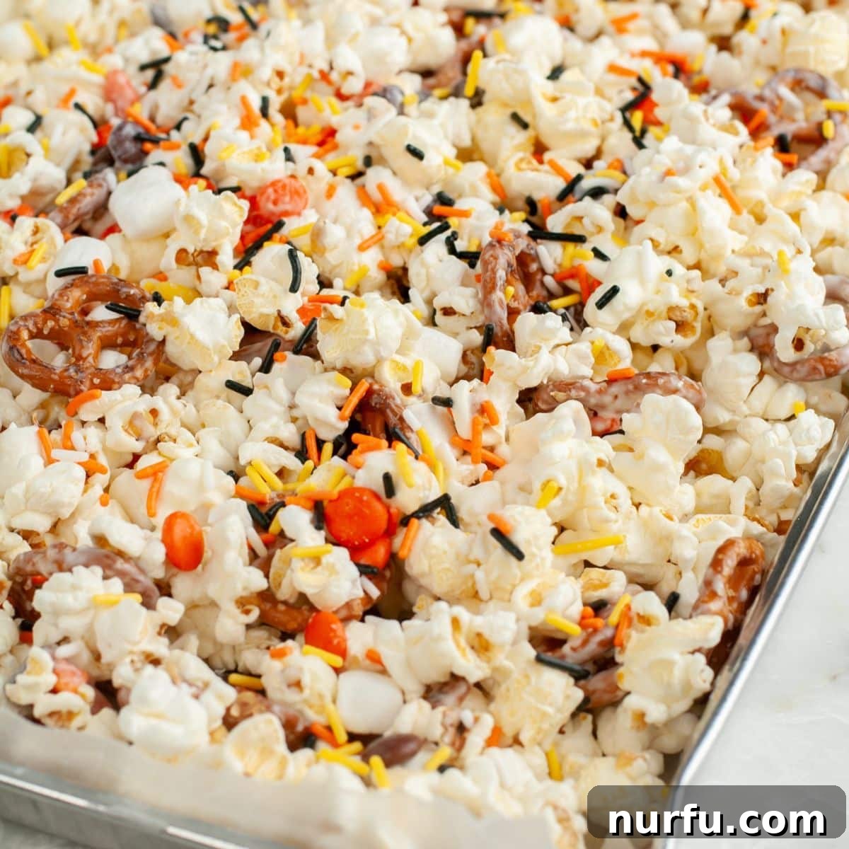 Sweater Weather Popcorn Mix 8 Pan with an abundance of Fall popcorn snack mix.