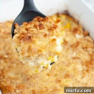 Creamy Swiss Corn Gratin 9 Spoon with Swiss corn bake.