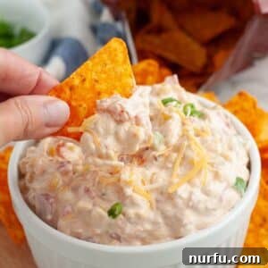 Dorito dip going into creamy dip.