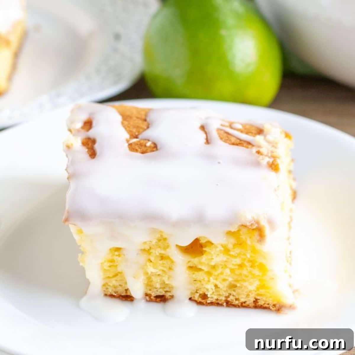 Glazed 7 Up Cake A delicious slice of 7 Up cake topped with a generous amount of glistening glaze.