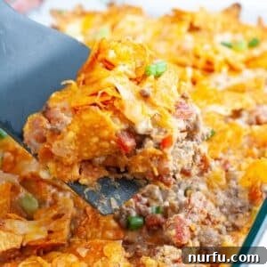 Spatula with Doritos casserole portion.