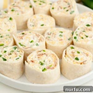 Plate of jalapeno popper pinwheels.