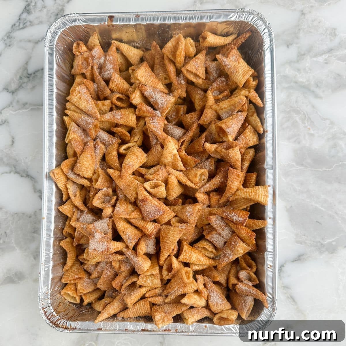 Pan with cinnamon sugar bugles. 