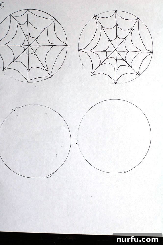 Spider Web Drawing Guide Hand-drawn spider web template on paper, serving as a guide for chocolate piping