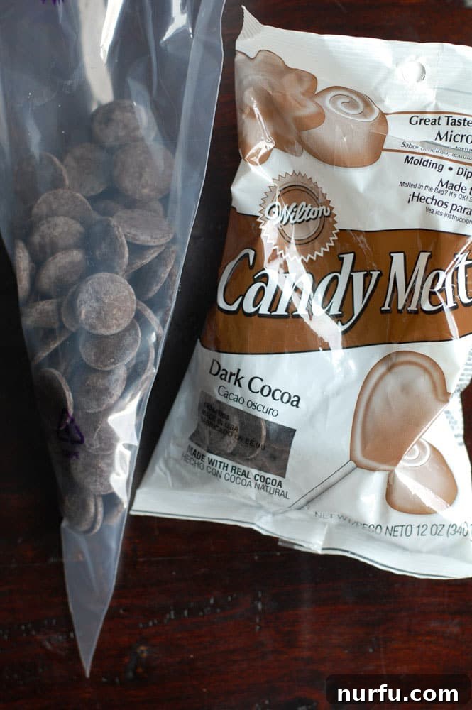 Chocolate Candy Melts Preparation Dark chocolate candy melts neatly contained in a clear piping bag, ready to be melted