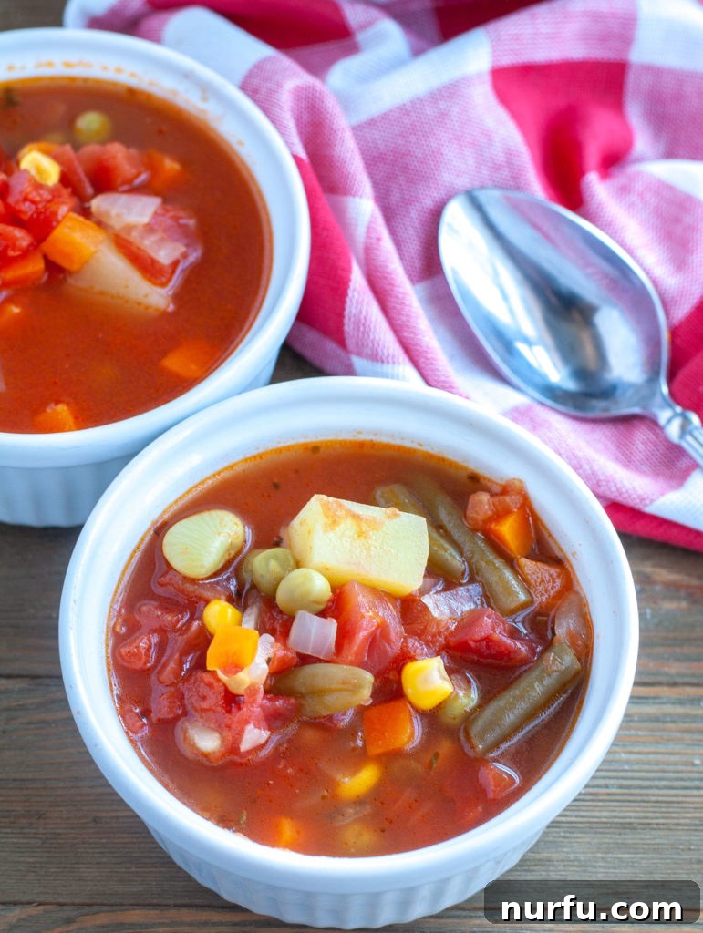 Delicious Instant Pot Vegetable Soup Bowls Bowls of Instant Pot vegetable soup served on a wooden table