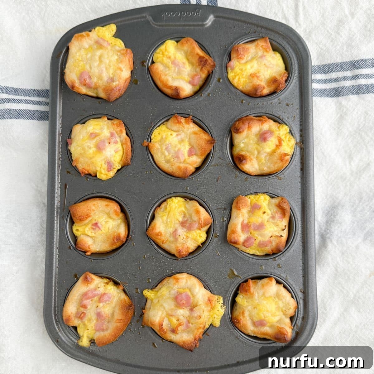 Savory Ham Puffs 8 A mini muffin tin filled with freshly baked, golden-brown ham and cheese puffs.