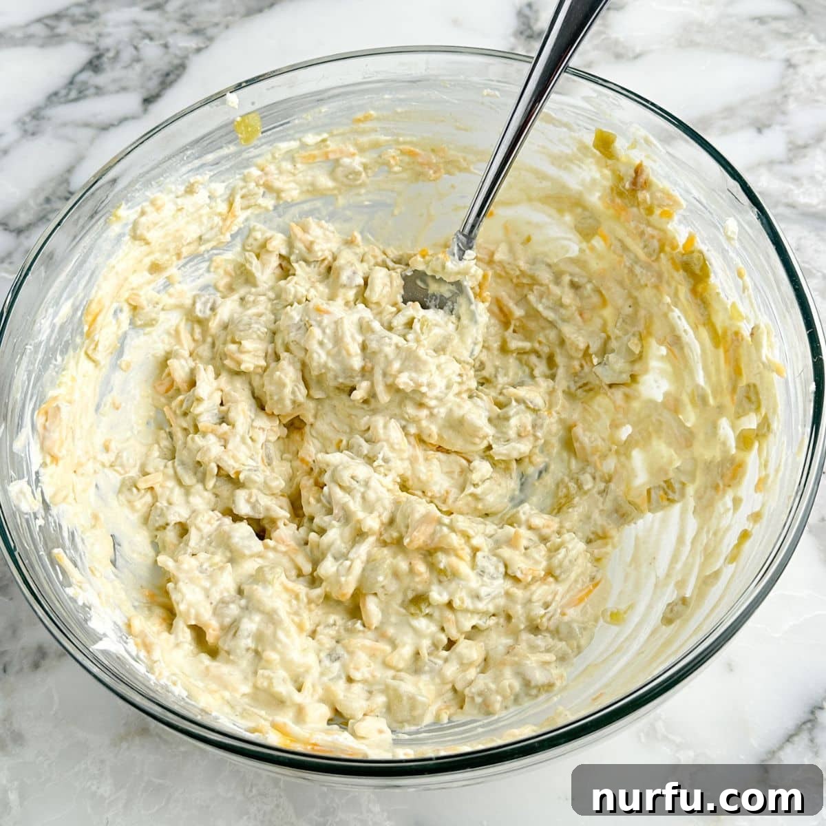 Zesty Green Chile Dip 4 Bowl of creamy cream cheese with green chiles.