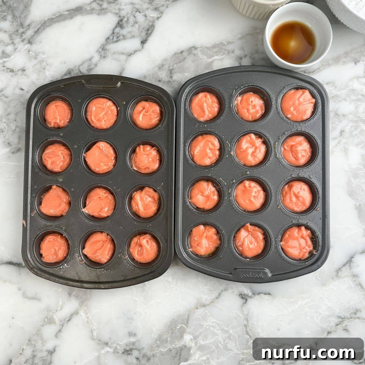 Strawberry Bloom Delights 5 Mini cupcake pan with strawberry cake batter.