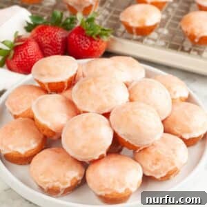 Plate of strawberry blossoms mini cakes.