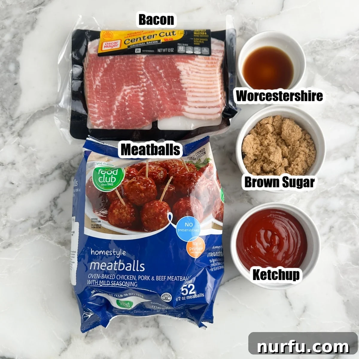 A flat lay photograph showcasing the key ingredients for bacon wrapped meatballs: a bag of frozen meatballs, strips of bacon, a bowl of light brown sugar, a bottle of ketchup, and a bottle of Worcestershire sauce.