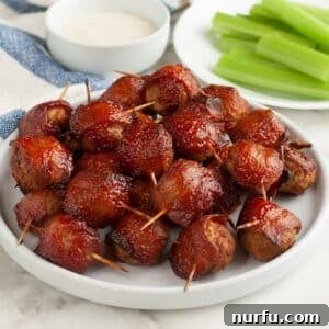 Plate of bacon wrapped meatballs.