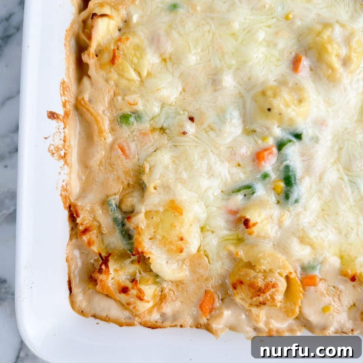 Baking dish with tortellini casserole.