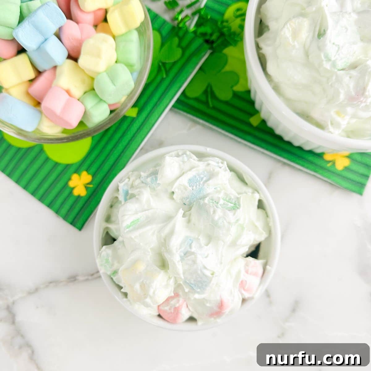 Pot of Gold Dessert Dip 7 Bowl of marshmallow dip, styled beautifully for a festive occasion.