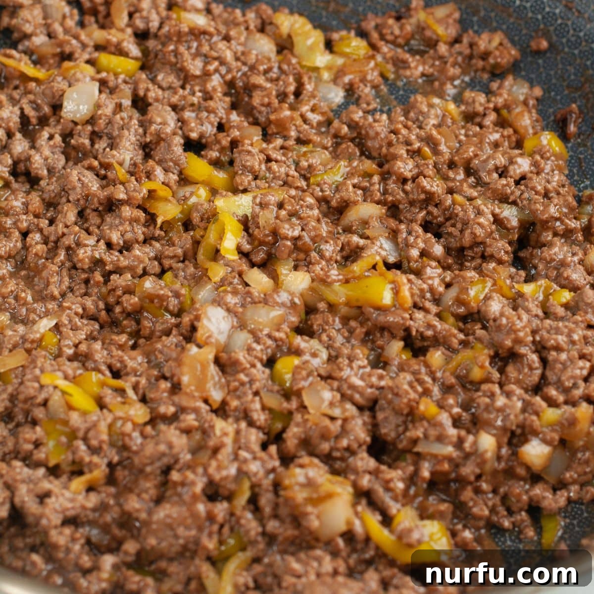 Mississippi Roadhouse Sloppy Joes 7 Ground beef mixture thickened and ready to serve in a skillet.