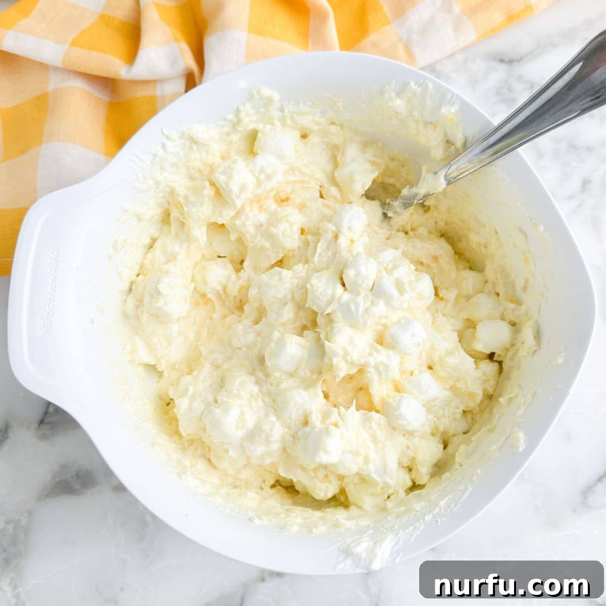 The final step shows a bowl of vibrant Lemon Fluff, perfectly chilled and ready to be enjoyed as a refreshing no-bake dessert.