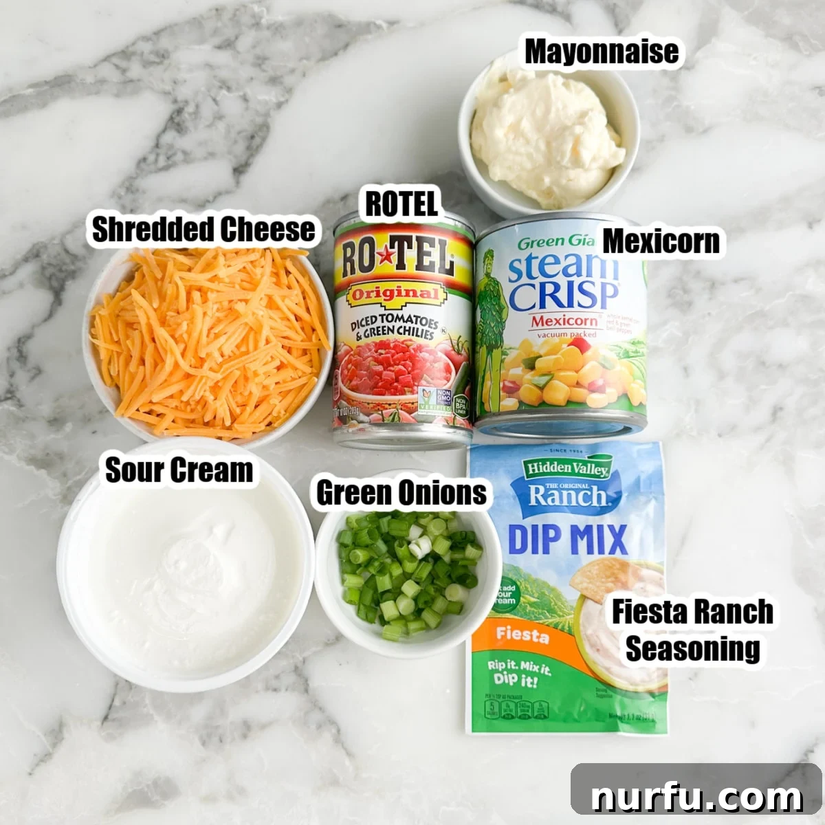 Creamy Fiesta Corn Dip Recipe for Parties and Game Day 3 Bowl of shredded cheese, sour cream, diced green onions, ROTEL, mexicorn, mayonnaise, and fiesta ranch seasonings.