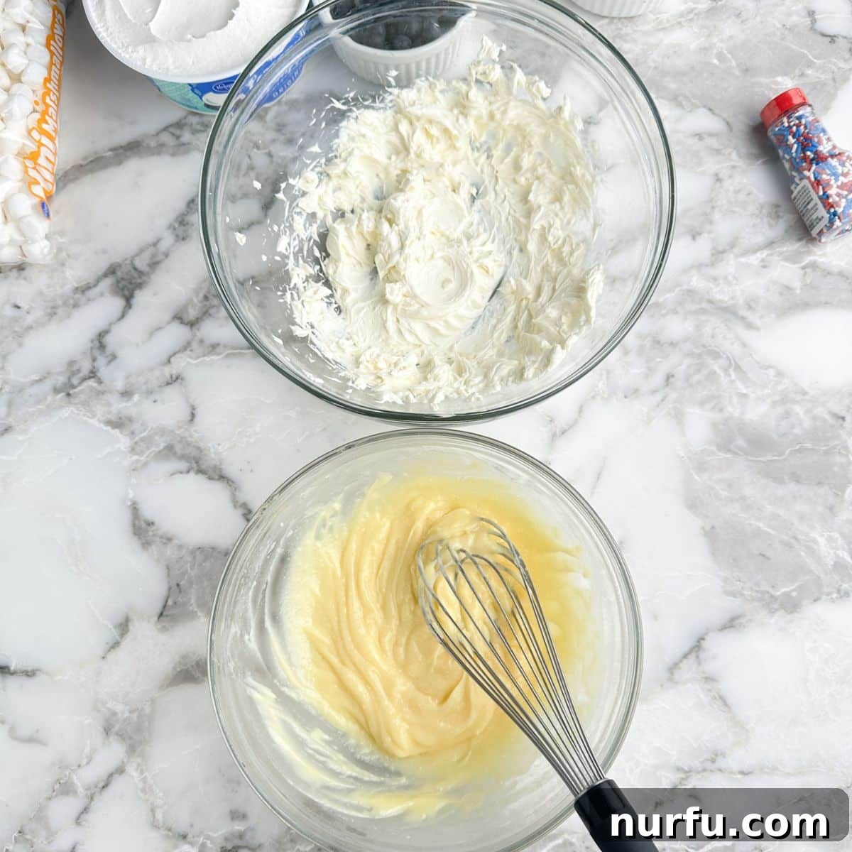 Patriotic Red, White & Blue Cheesecake Salad Recipe 4 Bowl with pudding and bowl with whipped cream cheese.