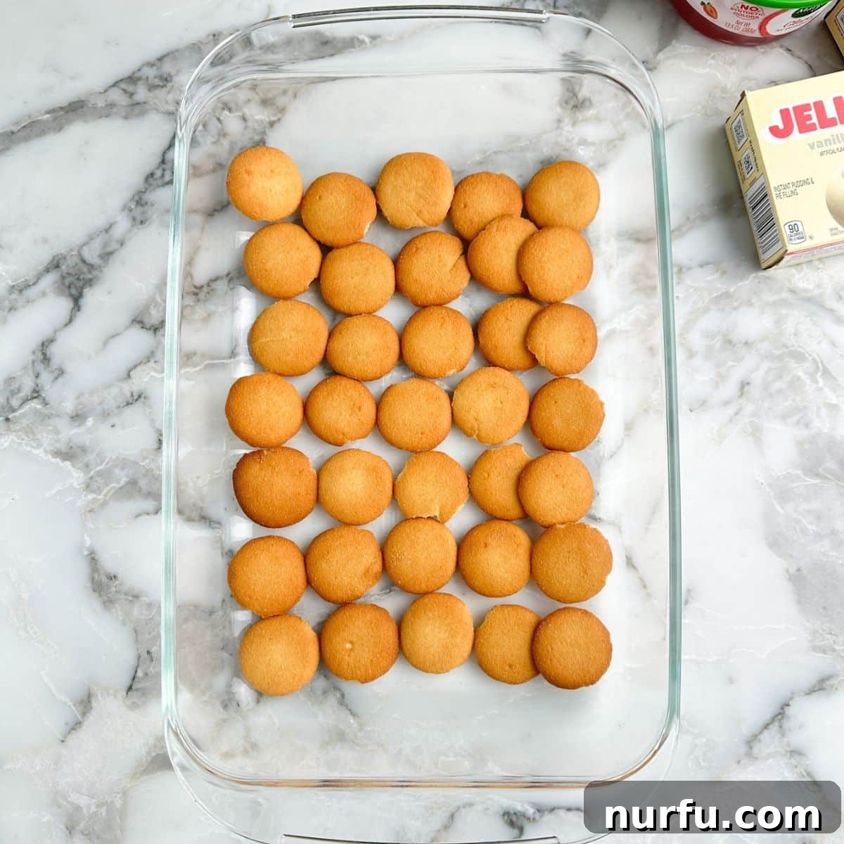 Strawberry Pudding Dessert Recipe: Creamy Berry Delight 4 Nilla wafers in a baking dish.