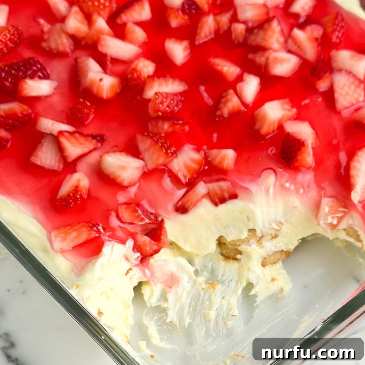 Strawberry Pudding Dessert Recipe: Creamy Berry Delight 6 Strawberry delight in a baking dish.