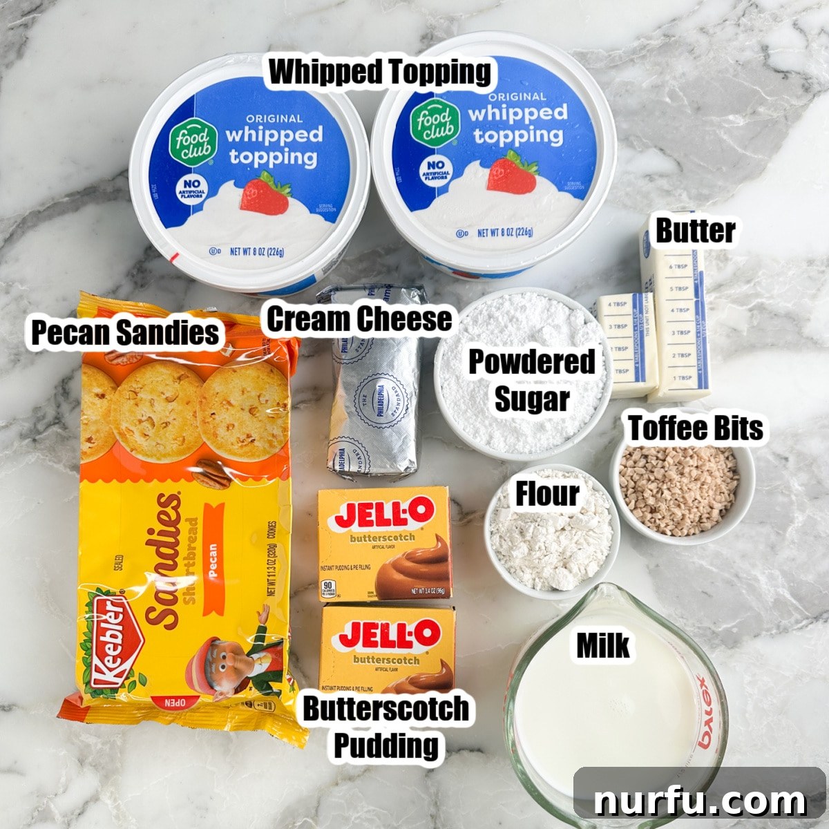 Butterscotch Dessert Recipes for Irresistible Treats 3 Whipped topping, pecan sandies, butterscotch pudding, milk, powdered sugar, butter, toffee bits, and cream cheese.