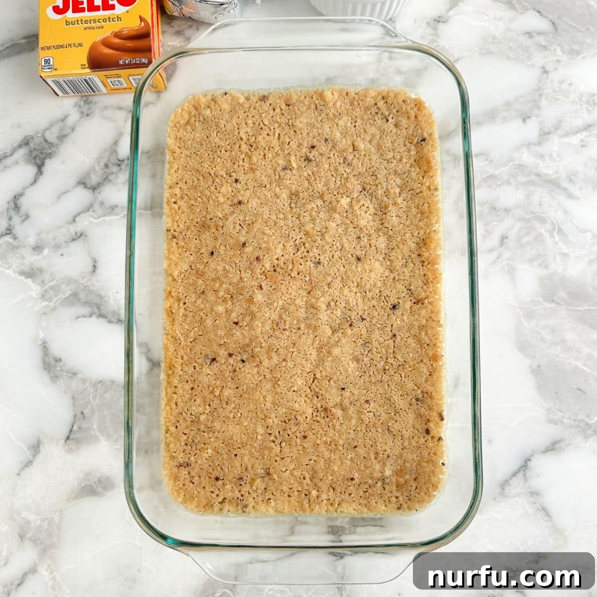 Butterscotch Dessert Recipes for Irresistible Treats 6 Baking dish with pecan sandie crust.