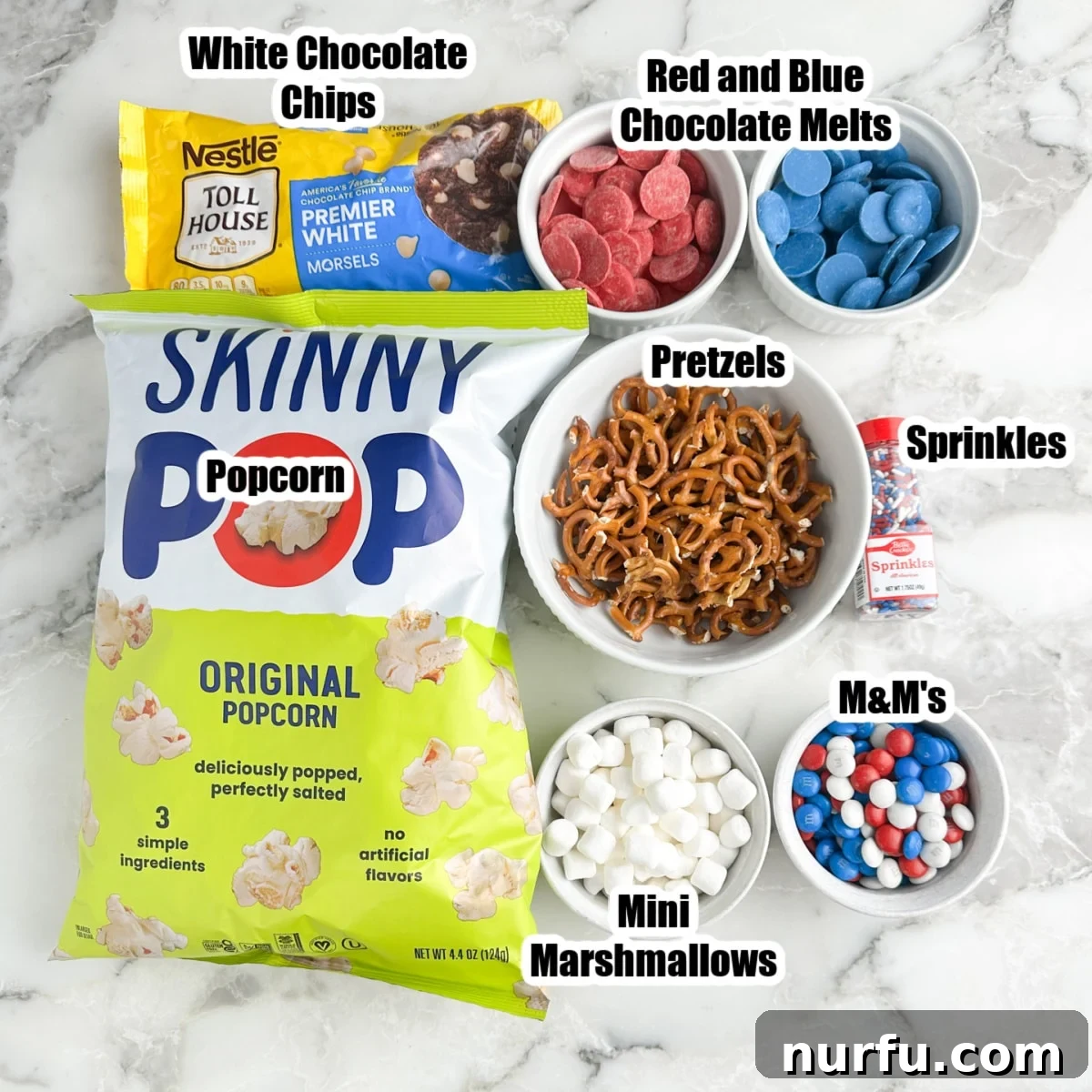 Patriotic Red, White & Blue Popcorn Snack Mix Recipe 3 Bag of popcorn, bag of white chocolate chips, pretzels, sprinkles, mini marshmallows, candy, and red and blue chocolate melts.