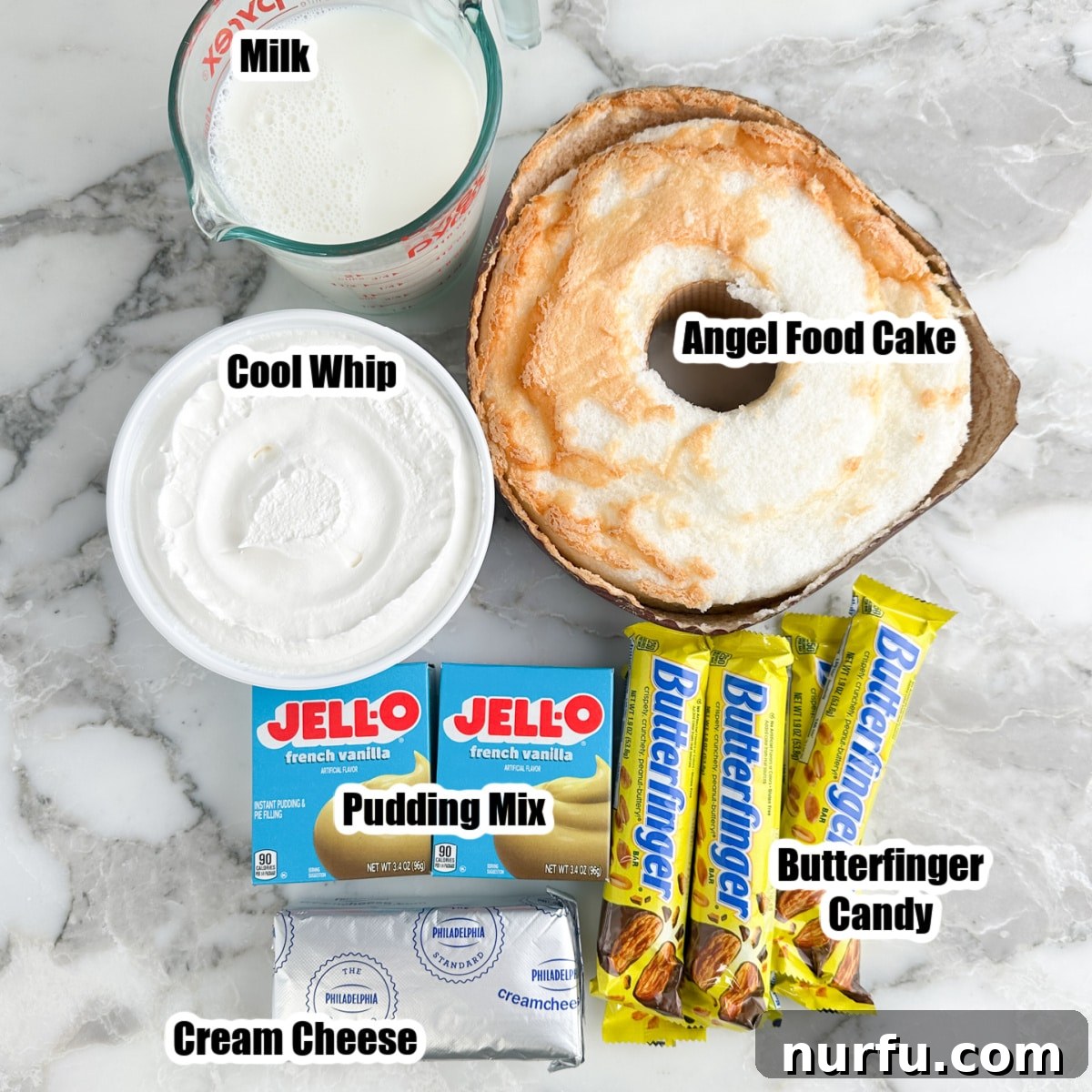 Irresistible Butterfinger Dessert Recipes for Chocolate Lovers 3 Angel food cake, Cool Whip, milk, pudding mix, Butterfinger candy, and cream cheese.