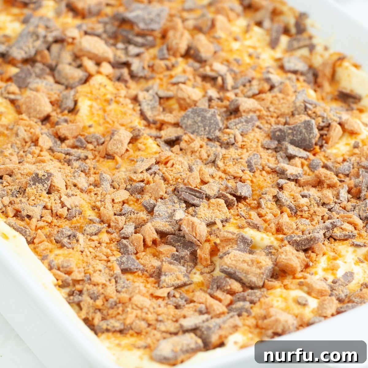 Irresistible Butterfinger Dessert Recipes for Chocolate Lovers 6 Baking dish with Butterfinger dessert.