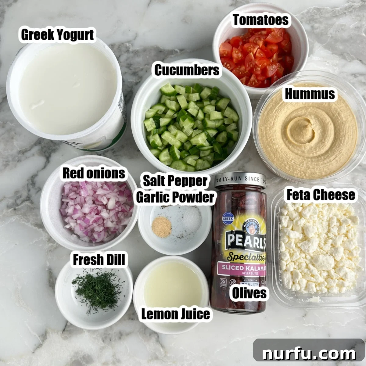 Mediterranean Greek Layer Dip Recipe – Flavorful Party Appetizer 3 Greek yogurt, diced cucumbers, red onion, tomatoes, dill, lemon juice, olives, Feta cheese, hummus, and seasonings.