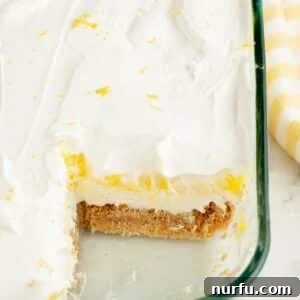 Lemon lush dessert in a baking dish.