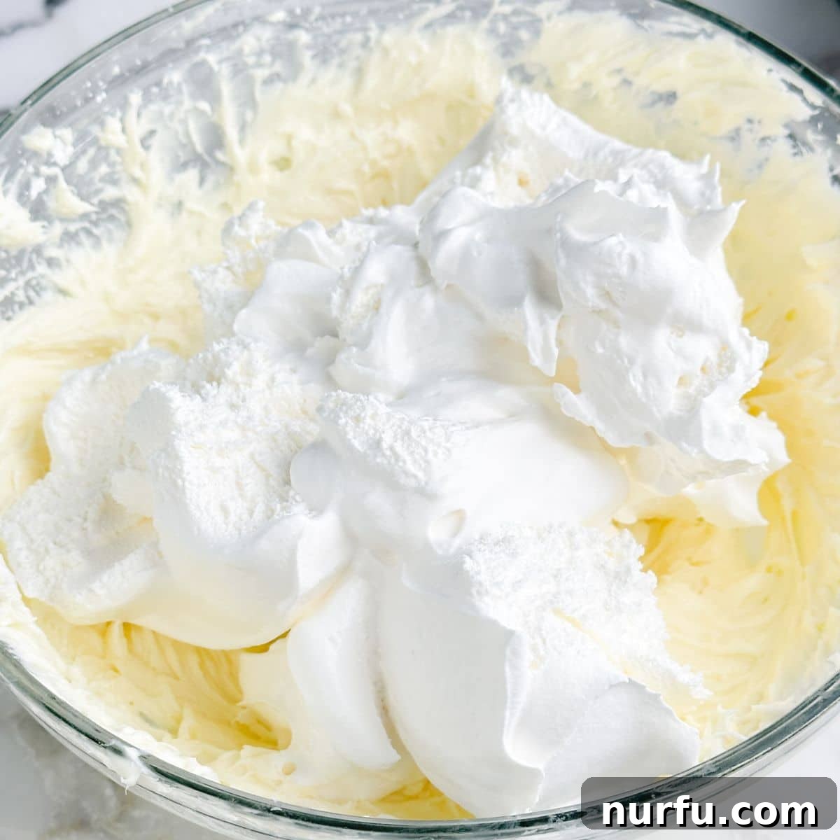 Growing Blueberries in Snowy Climates: Winter Care Tips 4 Bowl of whipped topping and whipped cream cheese.