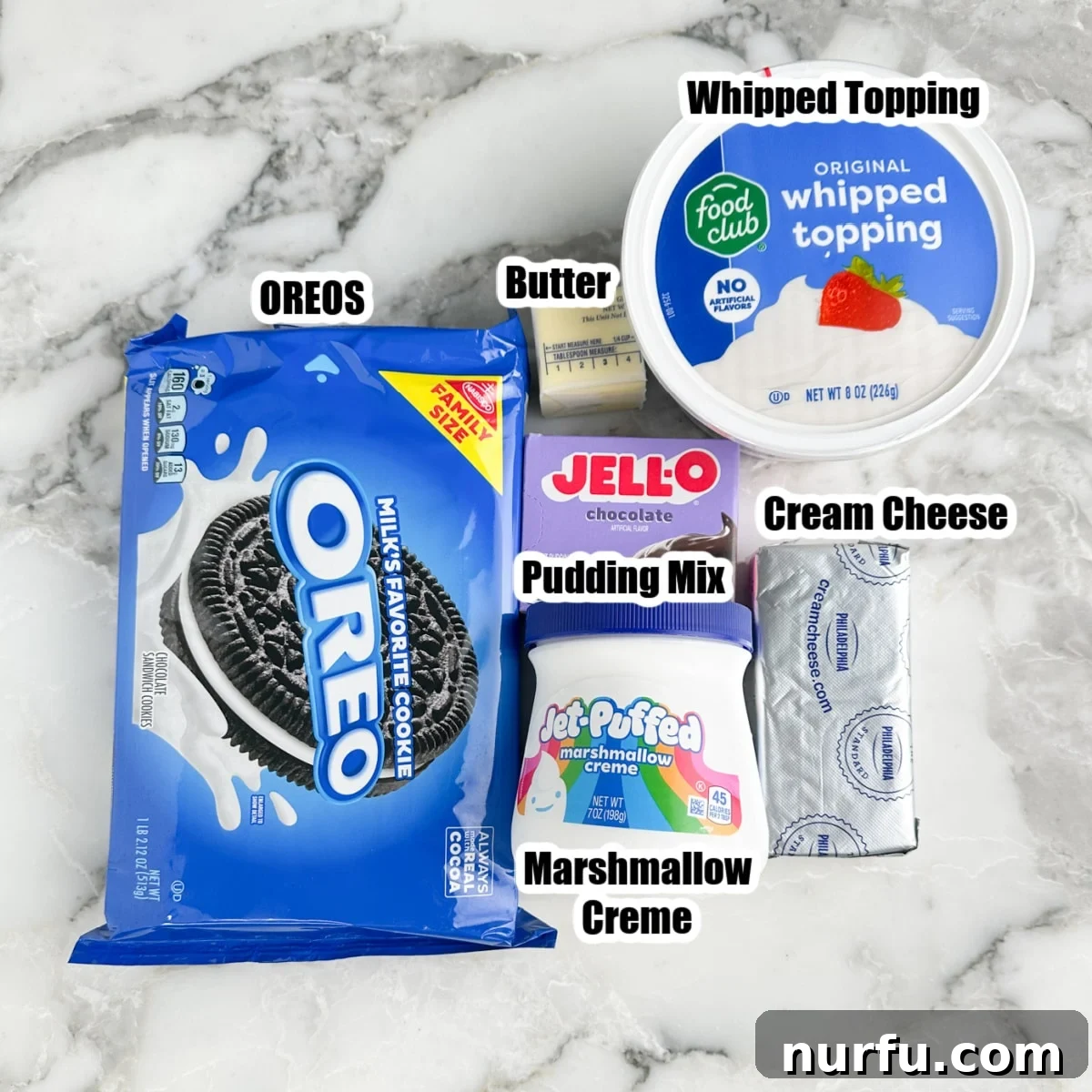 Oreos, whipped topping, butter, marshmallow creme, pudding mix, and cream cheese.