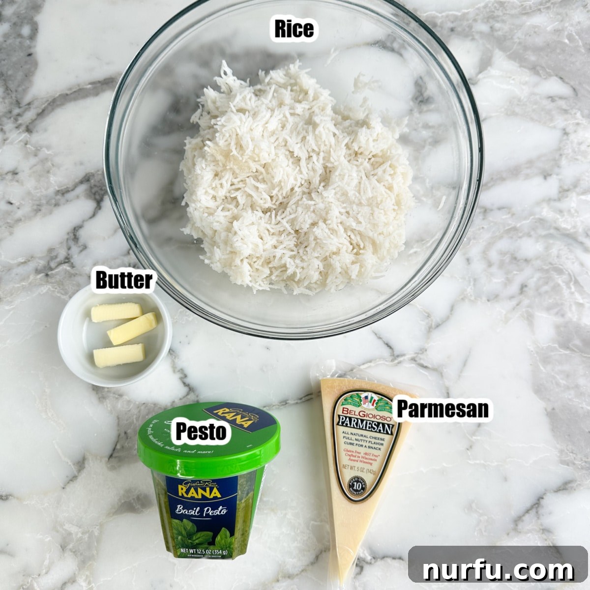 Bowl of rice, butter, pesto, and parmesan. 