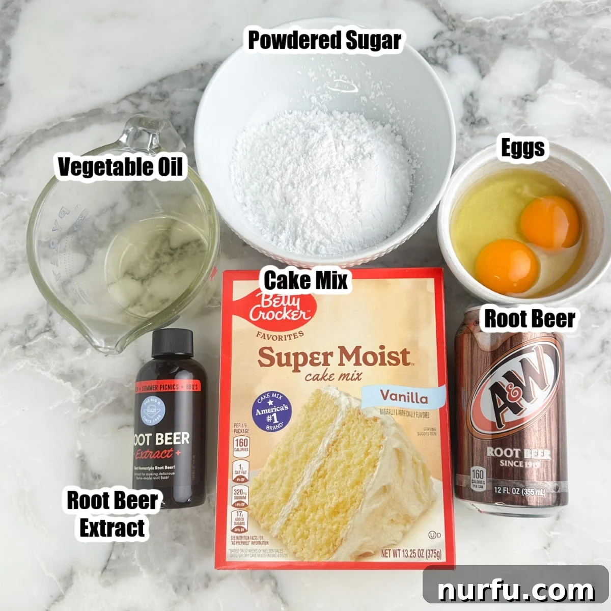 Box of cake mix, vegetable oil, powdered sugar, eggs, can of root beer, and root beer extract. 