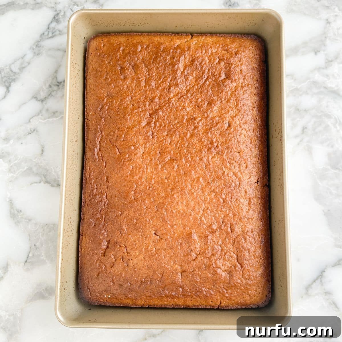 Baked root beer cake in a 9 x 13 pan. 