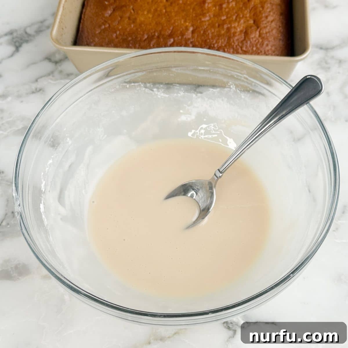 Bowl of root beer cake icing. 