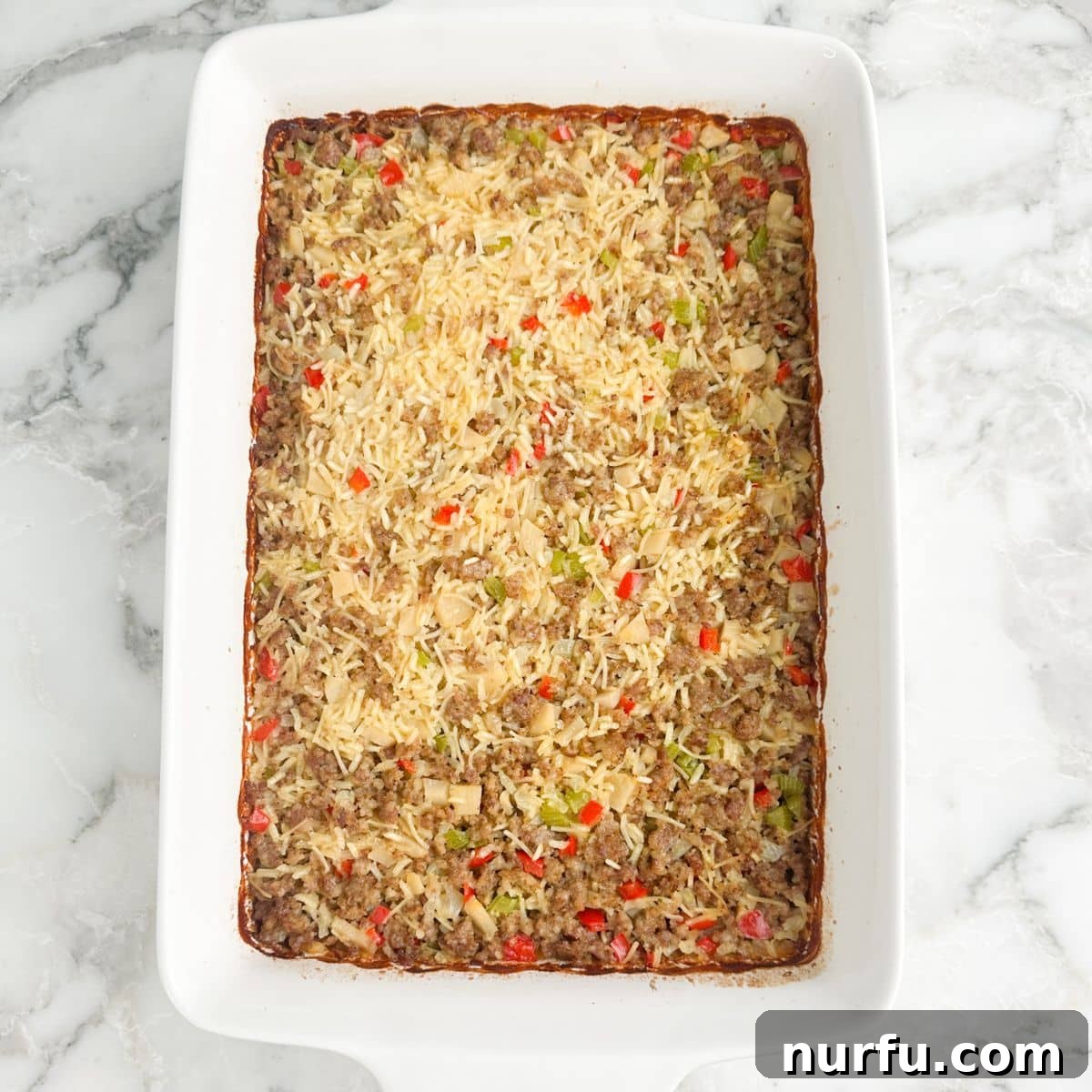 One-Pan Sausage and Rice Casserole 8 Casserole dish with sausage and rice casserole.