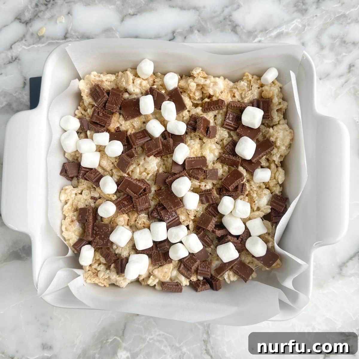 Baking dish with s'mores rice krispies treats.