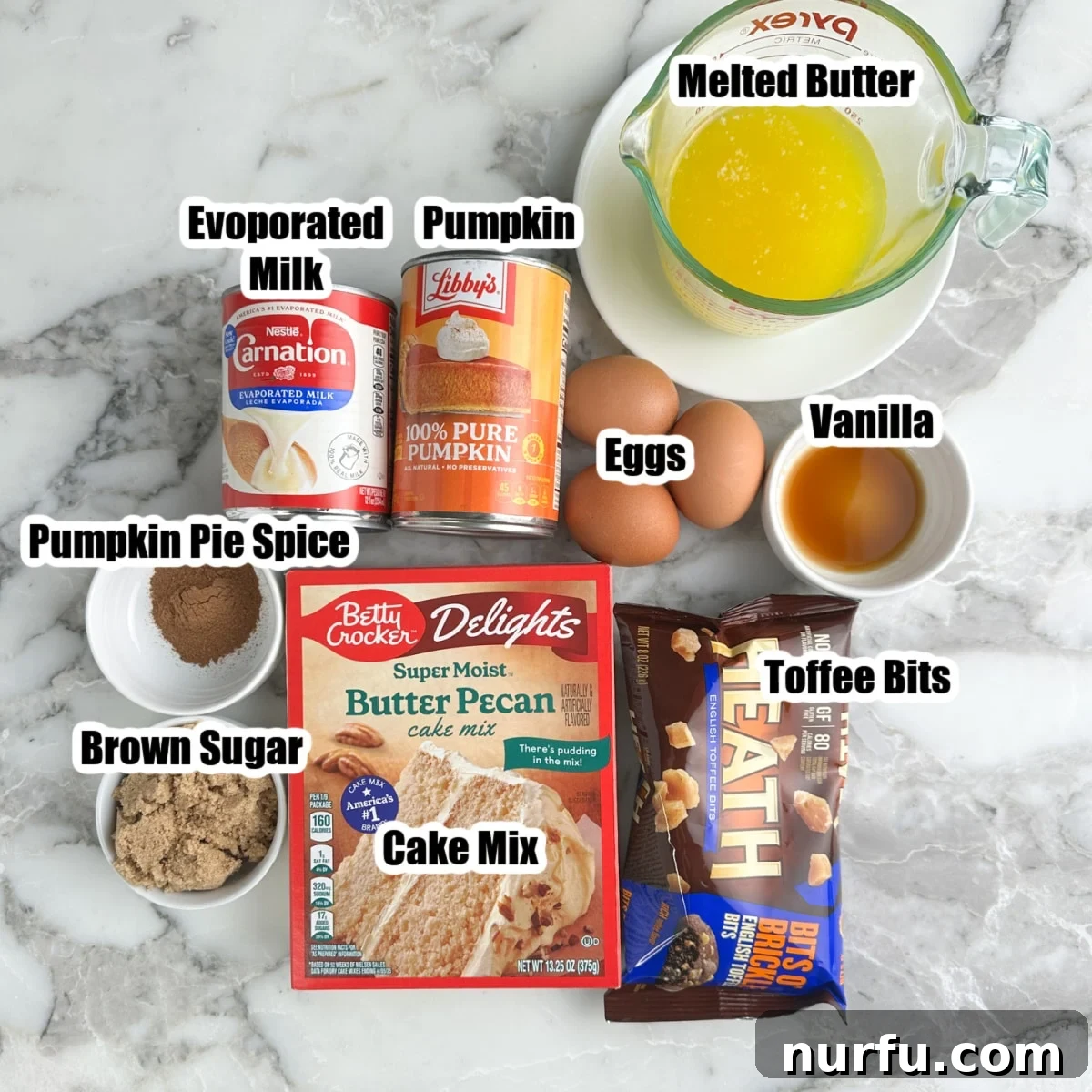 Classic Pumpkin Dump Cake with Warm Spices 3 Boxed cake mix, melted butter, toffee chips, evaporated milk, canned pumpkin, brown sugar, eggs, and pumpkin pie spice.